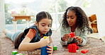 Girl, education and building blocks together, sisters playing at home with fun, toys and development. Learning, creativity and color, female children and quality time, puzzle and games in play room