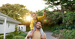 Piggyback, airplane and a father and child in nature, walking and bonding on a vacation. Happy, family and a young dad carrying a girl kid with a toy in a neighborhood park for playing in summer