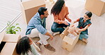 Happy family, box and real estate in new home above for renovation, mortgage loan or relocation at apartment. Top view of father, mother and children unboxing in house, investment or property owners