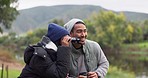 Nature, hiking  and travel, happy couple with binoculars for sightseeing adventure on lake holiday. Love, quality time and trekking in countryside, woods or forest, man and woman on vacation together