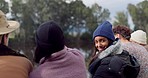 Friends, face and bonding by lake for camping, picnic and break for social gathering, travel or holiday. Smile, happy and portrait of woman with group of people by relax water, woods or nature forest