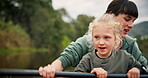 Girl, mother and rowing kayak in lake on holiday, vacation and travel together. Mom, child and kid paddle in boat, canoeing and bonding in river, water and fitness exercise on adventure with family