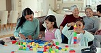 Home, family and building blocks with children, play and happiness with quality time, relax and loving together. Grandparents, mother and father with girls, toys and fun in the lounge and bonding