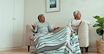 Couple, divorce and fight on sofa in home for breakup, argument and problems. Angry man, frustrated woman and mature partner in conflict of relationship crisis, stress and drama of difficult marriage