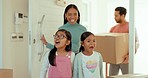 Parents, kids and moving, surprise for new house with excited and happy future at front door. Boxes, investing in property and young mom, dad and shocked girl children smile in family home together.