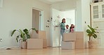 Parents, kids and wow, moving to new house with excited and happy future at front door. Boxes, investing in property and surprise for mom, dad and shocked girl children smile in family home together.