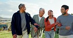 Family, senior parents and couple walking in nature for bonding, quality time and happiness. Talking, love and elderly mom and dad with daughter or son in law outdoors for holiday, vacation and relax