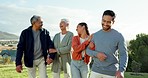 Nature, senior parents and couple walking for bonding, quality time and happiness outdoors. Happy family, love and elderly mom and dad with daughter or son in law for holiday, vacation and relax