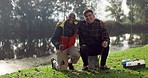 Fishing, lake and friends hug in nature on holiday, adventure and vacation together outdoors. Friendship, happy and portrait of men with rods by river for sports hobby, activity and catching fish