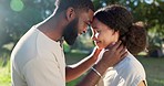 Love, nature and couple dancing with an intimate moment on a romantic date in a garden on holiday. Happy, smile and African young man and woman moving with affection in park on weekend trip together.