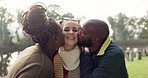 Group, portrait and friends together for a kiss, hug and love in outdoor park or people in nature on the weekend, holiday or spring vacation. Happy, face and couple embracing a girl or friend 
