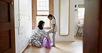 Mom, girl ballerina and dress in home for care, support or prepare for dance lesson, class or school. Ballet student, mother and daughter in clothes, start or tutu with helping hand in family house