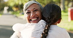 Child, happy grandmother and hug at a park outdoor in nature for happiness, adventure or fun play. Senior woman and kid embrace in forest for family travel, wellness and freedom with love and care