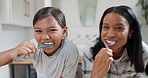 Face, mom and girl child brushing teeth in bathroom for dental wellness, morning routine or healthy habits. Portrait, kid and mother cleaning mouth with toothbrush, self care and fresh breath at home