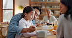 Breakfast, kiss and father feeding girl cereal at home in the morning together. Funny dad, mother and child eating food for nutrition, healthy diet and wellness with care of happy parents bonding.