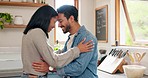 Love, hug and couple in a kitchen happy, together and intimate while bonding in their home. Embrace, romance and man with woman hugging, smile and sharing moment of trust, care or soulmate connection