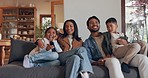 Happy, family on a sofa or watching television with happiness, quality time or bonding together. Parents on a couch, mother or father with children, kids or movies with cartoons, home or subscription