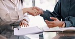 Handshake, signature and business people of contract documents, partnership deal or job agreement at office. Hiring, recruitment of b2b woman shaking hands in career negotiation, success or agreement