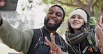 Camping, couple and selfie with with peace, hands and bonding in a forest with freedom and smile. Profile picture, happy and man with woman at campsite in nature, relax and fun in woods together