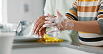 Foam, washing and hands with mom and kid for hygiene in kitchen for teaching for safety. Woman, teaching and child with soap for care in home with learning for skincare for wellness or stop dirt.