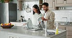 Smile, couple cleaning dishes and playing with towel, fun chores together and love in apartment. Man, woman and washing crockery, housework in kitchen and bonding, marriage and heathy relationship.