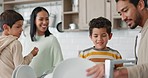 Happy, help and a family washing dishes together, children cleaning and talking in the kitchen. Laughing, house and a boy kid with a helping hand for a father after dinner with a mother speaking