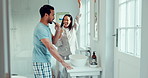 Couple, dancing and brushing teeth in home bathroom while  dental hygiene, fun and happiness. A woman and man with toothbrush and toothpaste for health, cleaning mouth and wellness while singing