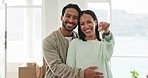 Happy couple, real estate and hug with keys for new home, property or investment together indoors. Portrait of man and woman owners for moving in, goals or mortgage loan in happiness for buying house