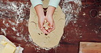 Hands, baking and kid with shape in top view for learning in home with cookies for development. Dough, tools and teaching with child or flour for support with process or recipe for ginger bread man