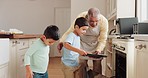 Oven, kitchen and senior man with his grandchildren baking cookies for sweet treats, dessert or snack at home. Equipment, ingredients and grandfather preparing biscuits with boy kids in family house.