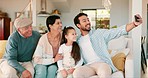 Father, girl and grandparents in selfie, couch and home living room with smile, love and together for memory. Men, women and daughter in family house with love, care and bonding for social media app