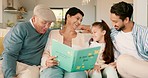 Grandparents, girl kid and book on sofa for reading, learning and storytelling with care, bonding and love. Dad, senior man and woman with child, fairytale and teaching for education in family home