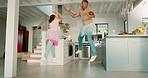 Father, girl and ballet with dancing, tutu and high five with playing, goals or bonding together in kitchen. Happy dad, young daughter or ballerina with comic game, jump or motivation in family house