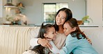 Mom, couch and hug with girl kids and parent care in a home with a smile from family love. Children, happy and mother on a lounge sofa in a living room with support and having fun together with youth