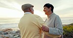 Dance, sunset and elderly couple at beach, funny and laughing on holiday. Romantic, senior man and woman at sea, smile and enjoy time together in retirement with love on vacation outdoor at ocean.