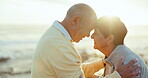 Love, romance and a senior couple on the beach together for bonding outdoor in nature on their anniversary. Smile, flare or summer with an old man and woman sharing an intimate moment by the ocean