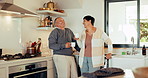 Old couple, talking in kitchen with coffee and laughing together, communication and happy in retirement. Pension, marriage and life partner, man and woman at home, bonding with love and funny story