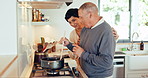 Food, cooking and a senior couple in the kitchen together, bonding while in their home to prepare a meal. Dinner, love or smile with a happy old man and woman getting cuisine ready for nutrition