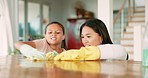 Table, cleaning and mother with girl child in their home for housework, hygiene or dust prevention. Household, clean and asian woman with kid in living room for help, learning or task responsibility 