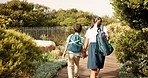 School, morning and back of children walking for commute, transport and traveling to class. Education, child development and happy kids holding hands skipping to academy, classroom and learning