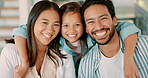 Face, happy family and mother, father and girl in home, bonding and having fun together. Child, smile and parents hug in portrait with care, love and relax to enjoy quality time on holiday in house.