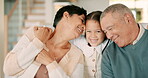 Grandparents, face and hug girl in home, bonding and smile together. Child, grandmother and grandfather embrace in portrait with care, happy and love, family relax and enjoying quality time in house.