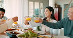 Thanksgiving toast with kids, parents and grandparents together as a family for bonding or eating food in celebration. Love, brunch or cheers with children and relatives at the dining room table