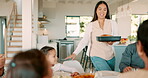 Thanksgiving, roast chicken and a woman serving her family while bonding in celebration together with food. Love, lunch or brunch with a mother carrying a meal to a dining room table during holidays