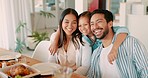 Family dinner, girl hug parents and food at table with happy conversation, love or bonding together. Father, mother and daughter for lunch, chat or relax with care, smile or laugh at house in Jakarta