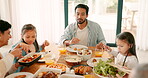 Children, parents and grandparents at thanksgiving brunch together as a family eating food for bonding in celebration. Love, lunch or sunday roast with kids and relatives at the dining room table