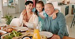 Family dinner, girl hug grandparents or food at table for happy conversation, love or bonding together. Senior man, woman and kid at lunch, chat or relax with care, smile or laugh at house in Jakarta
