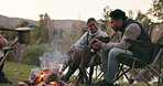 People, camping with a dog and fire in nature, outdoor adventure or friends together on holiday, trip or relax in the woods. Couple, campfire and man with a pet bonding, quality time or fun vacation