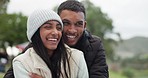 Happy couple, hug and happiness outdoor with love and commitment, trust and safety together in woods. Bonding, support and care with date in nature, young man and woman in park with youth embracing