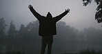 Silhouette, success and person celebrate while hiking in a forest in the morning happy for travel achievement in the dark. Winner, excited and motivation by hiker winning and enjoy adventure